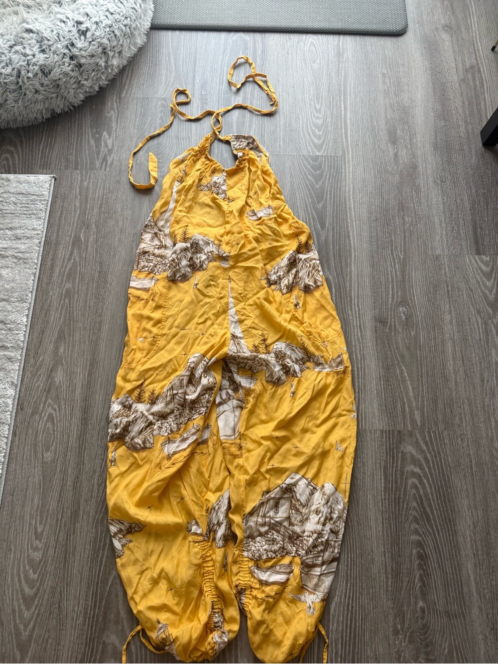 Yellow Halter One-Piece Jumpsuit with Scenic Print from Revolve